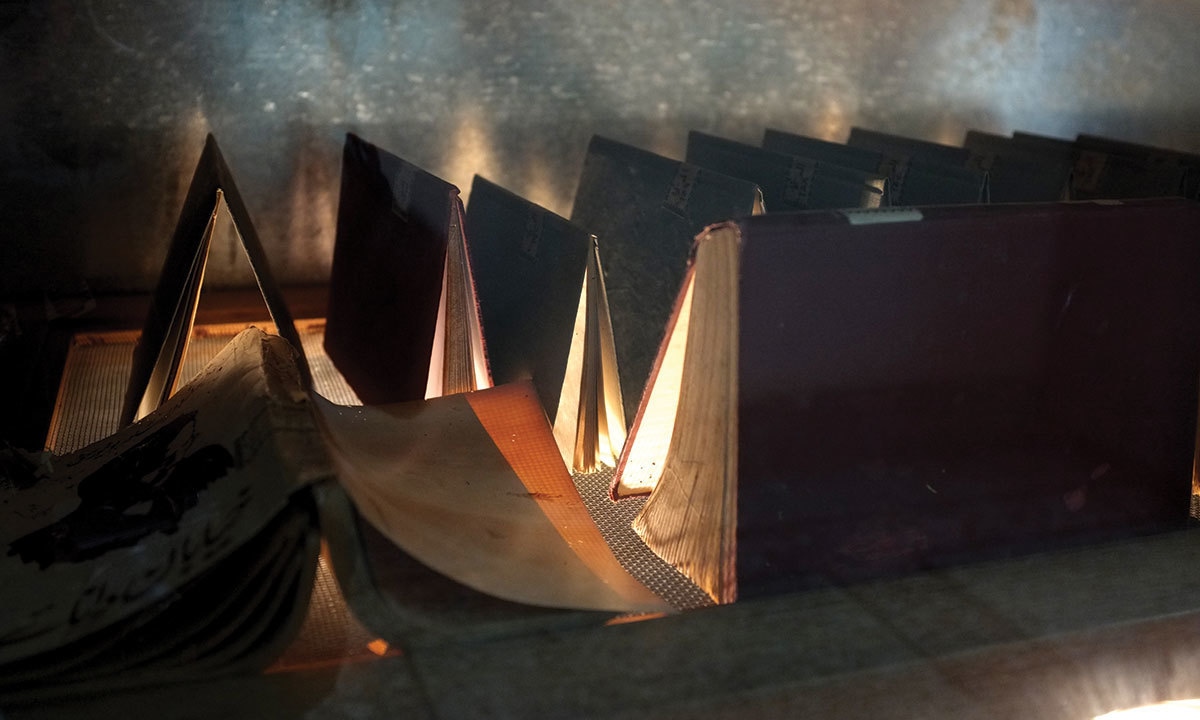 Books being fumigated at Anjuman Taraqqi-e-Urdu's library in Karachi | Arif Mahmood, White Star