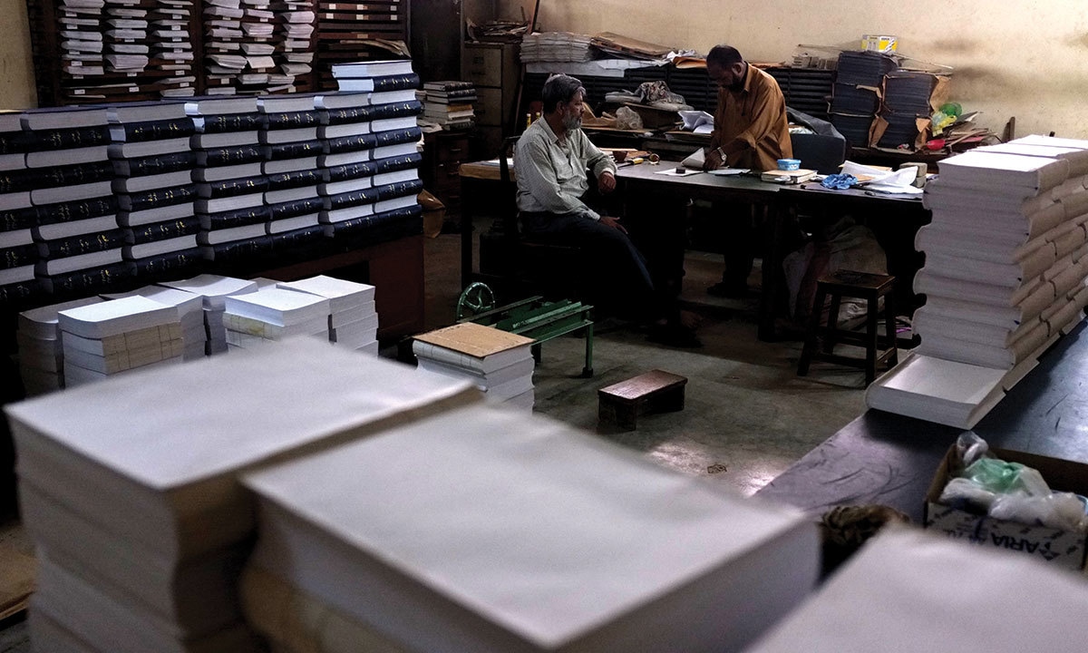Workers bind dictionaries at the Urdu Dictionary Board in Karachi | Arif Mahmood, White Star