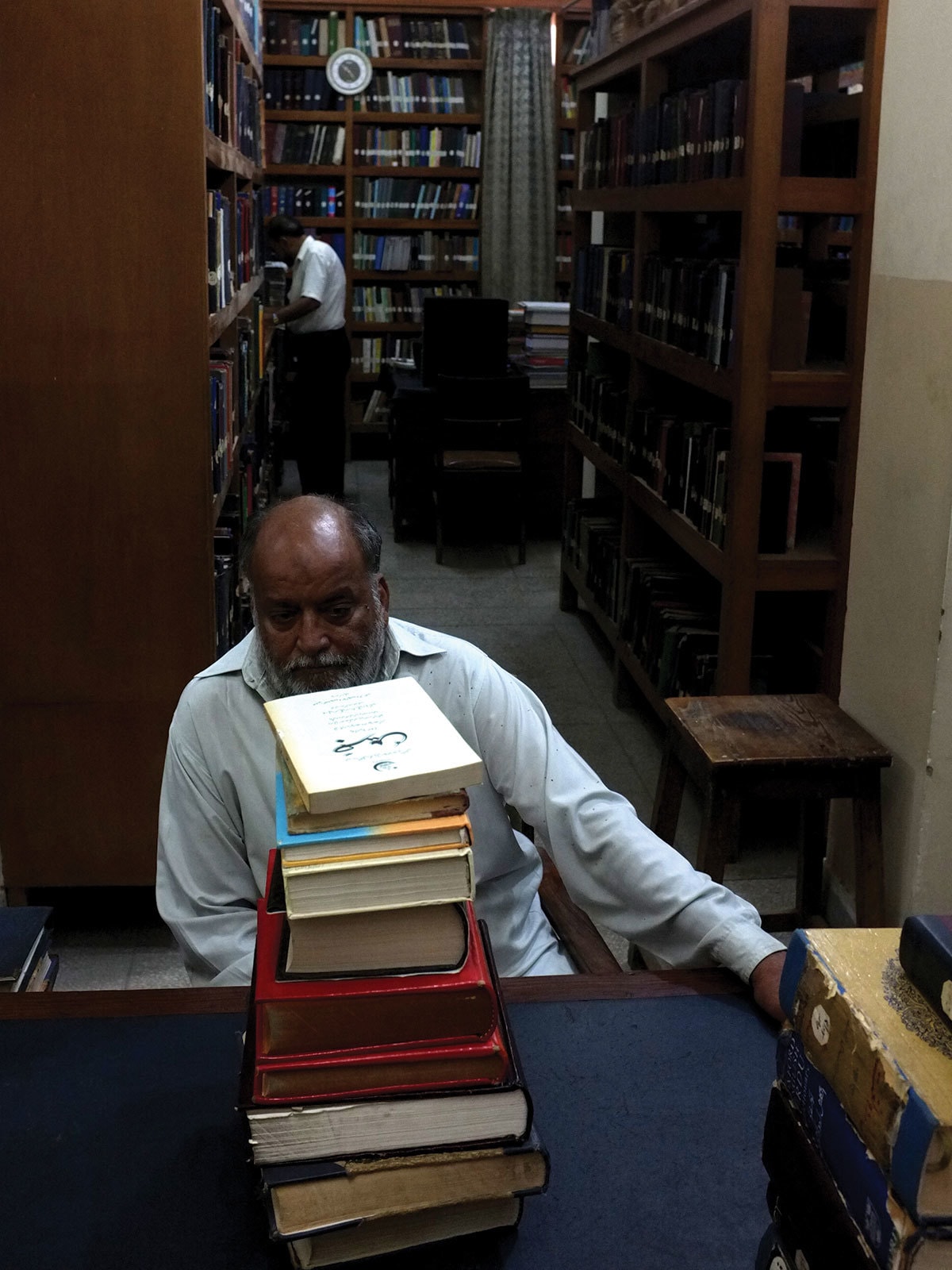 A staffer at the Urdu Dictionary Board in Karachi | Arif Mahmood, White Star