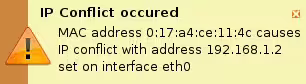 An IP Address Conflict GUI dialog triggered by IPwatchD Daemon