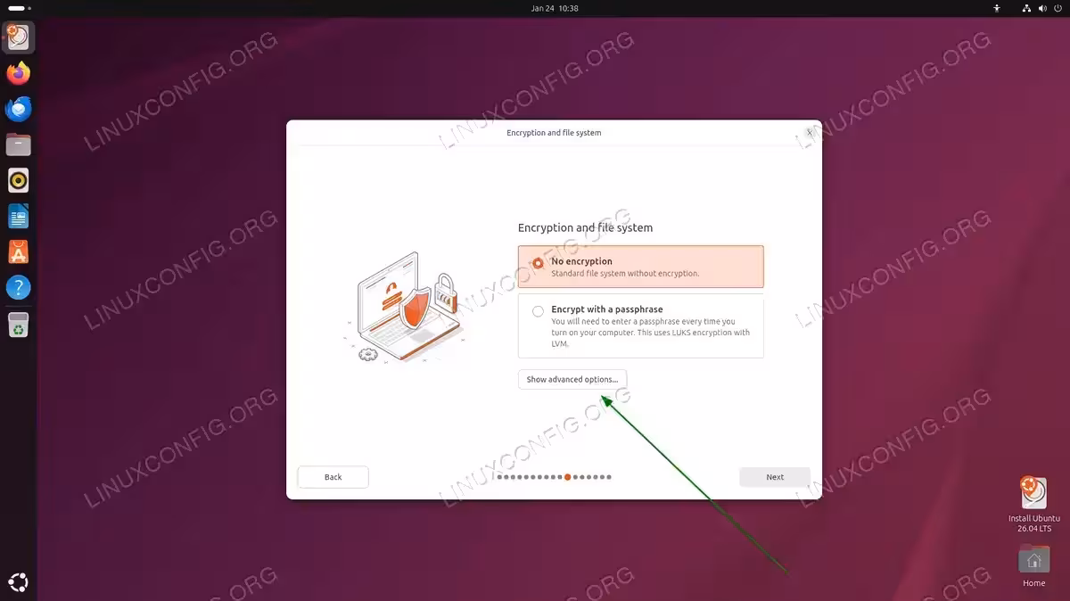 Ubuntu 26.04 encryption and file system screen with arrow pointing to "Show advanced options" button where ZFS option is hidden