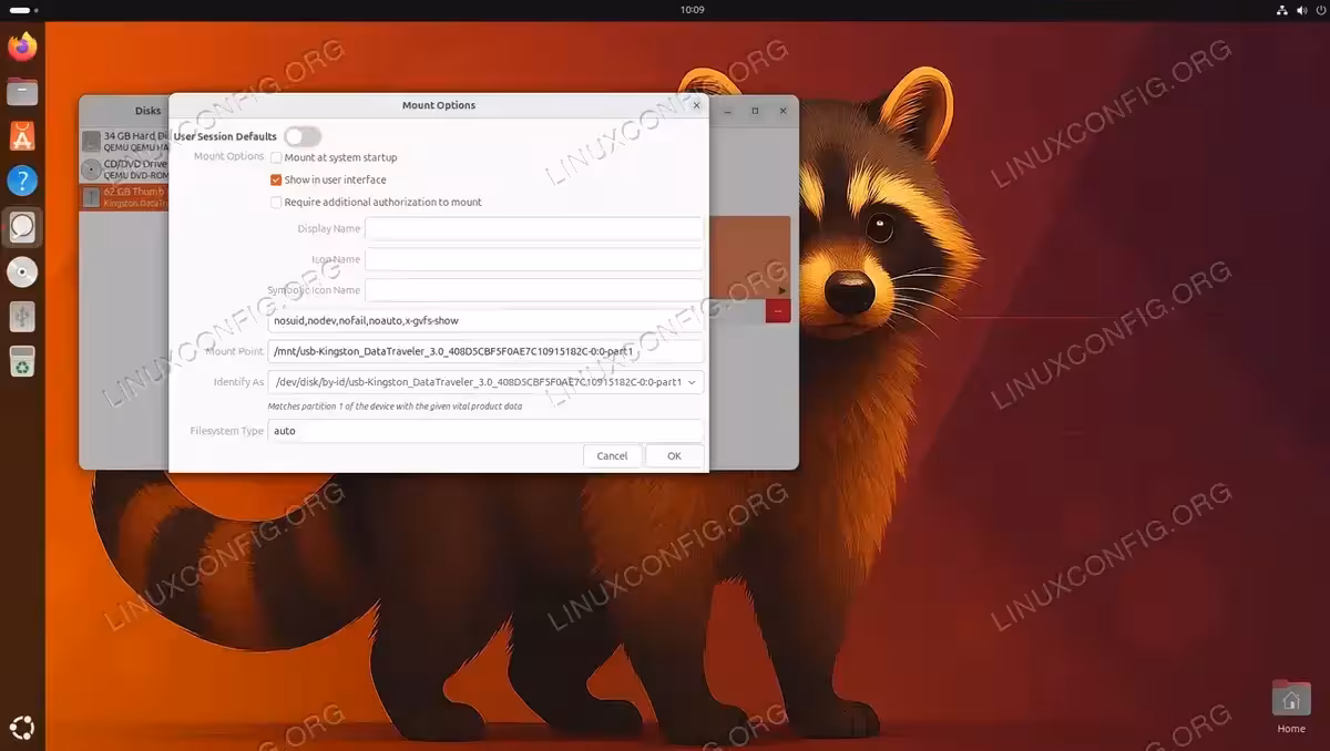 GNOME Disks application showing Mount Options dialog for Kingston DataTraveler USB drive with mount at startup and filesystem options on Ubuntu 26.04